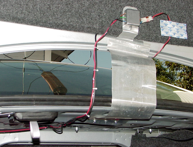 View of Trunk Lid Underside Showing Ground Strap and EMI Filter