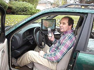 Photo of Stephen Smith in car with SSTV